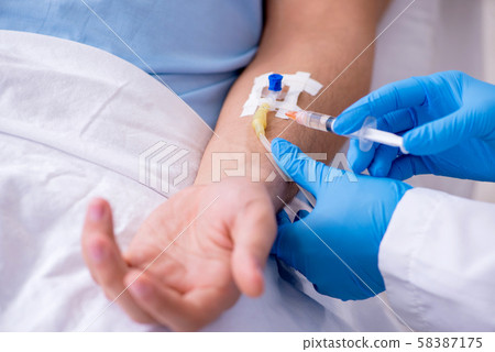 Male patient in blood transfusion concept Male patient in blood transfusion concept 58387175