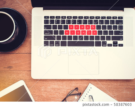human rights concept. word human rights on red keyboard laptop with vintage effect, flat lay human rights concept. word human rights on red keyboard laptop with vintage effect, flat lay 58387603