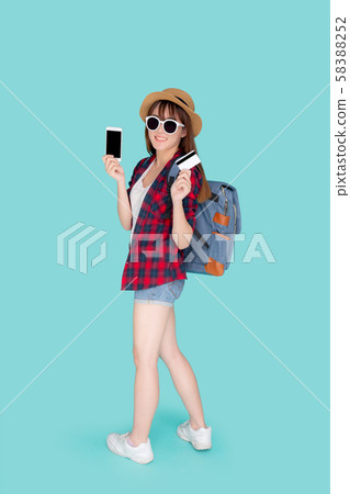 Beautiful portrait young asian woman wear travel summer fashion holding credit card and smart phone 58388252