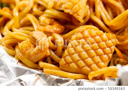 Seafood soy sauce fried noodles. (Aluminum foil wrap) Seafood soy sauce fried noodles. (Aluminum foil wrap) 58389163
