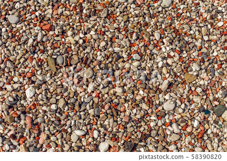 Wet colorful pebble on shore of Mediterranean Sea Wet colorful pebble on shore of Mediterranean Sea 58390820