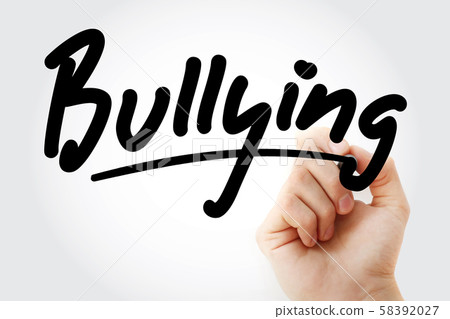 Hand writing Bullying with marker 58392027