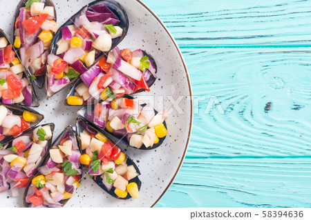 Traditional Peruvian food background with mussels Traditional Peruvian food background with mussels 58394636