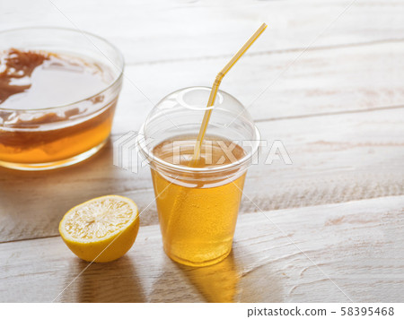 Organic fermented tea drink Kombucha with lemon Organic fermented tea drink Kombucha with lemon 58395468
