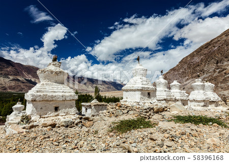 Whitewashed chortens Tibetan Buddhist stupas . Nubra valley, Ladakh, India Whitewashed chortens Tibetan Buddhist stupas . Nubra valley, Ladakh, India 58396168