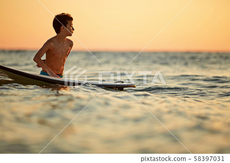 Surf long board training practitioner in action 58397031
