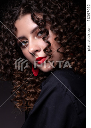 Beautiful teenager girl with afro curls and bright Beautiful teenager girl with afro curls and bright 58397032