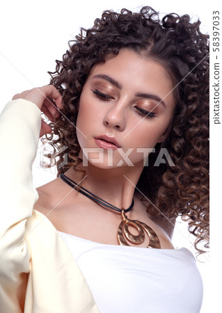 Beautiful teenager girl with afro curls and bright Beautiful teenager girl with afro curls and bright 58397033
