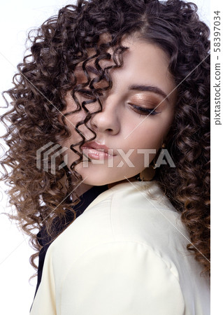 Beautiful teenager girl with afro curls Beautiful teenager girl with afro curls 58397034
