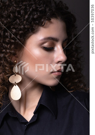 Beautiful teenager girl with afro curls and bright Beautiful teenager girl with afro curls and bright 58397036