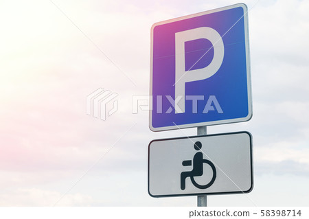 Blue roadsign Parking lot for the handicapped people with a tablet Blue roadsign Parking lot for the handicapped people with a tablet 58398714