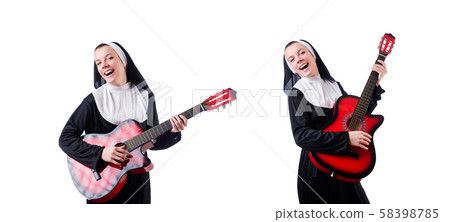 Nun playing guitar isolated on white Nun playing guitar isolated on white 58398785