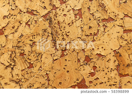 Close-up of cork sound insulation lagging with interspersing of paint floors and walls Close-up of cork sound insulation lagging with interspersing of paint floors and walls 58398899