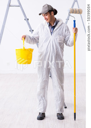 Painter working at construction site Painter working at construction site 58399084