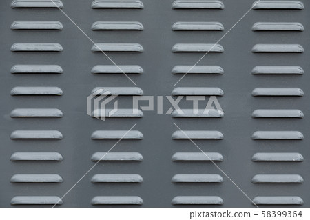 Close-up of metal surface with gaps for airing 58399364