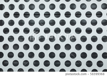 Flatlay of black and white polka-dot metal corrugated surface 58399368