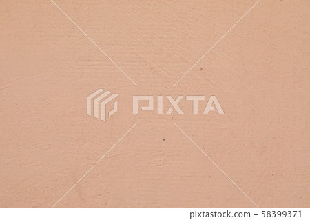 Close-up of smooth beige painted wall of a building 58399371
