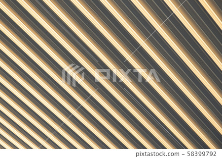 Close-up of beige-grey corrugated surface, eliciting optical illusion Close-up of beige-grey corrugated surface, eliciting optical illusion 58399792