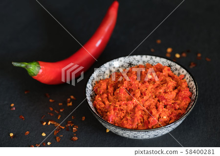 Traditional Maghrebi hot chili pepper sauce paste Traditional Maghrebi hot chili pepper sauce paste 58400281