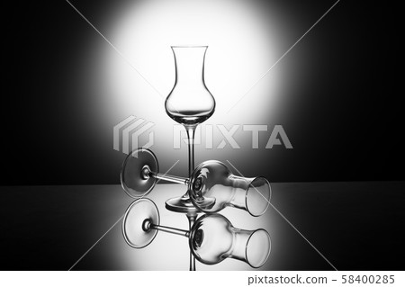Two beautiful elegant shot glasses of grappa in 58400285