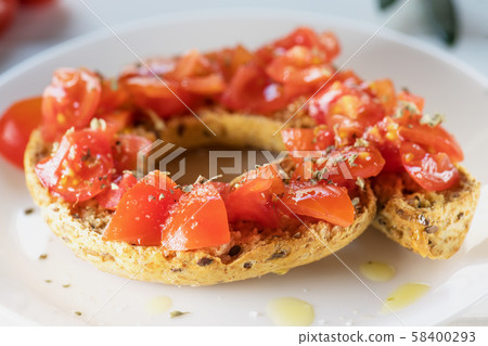 Tipical summer dish of Puglia - friselle. 58400293