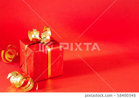 Red gift box on red background. Red gift box on red background. 58400348