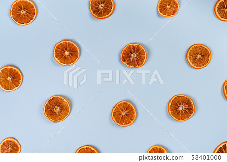 Dried slices of orange pattern on blue background 58401000