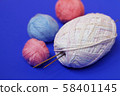 Woolen thread and knitting needle. 58401145