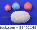 Woolen thread and knitting needle. 58401148