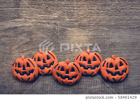 Halloween gingerbread cookies on wooden Halloween gingerbread cookies on wooden 58401429