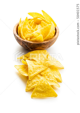 Corn nacho chips. Yellow tortilla chips in bowl. 58401575