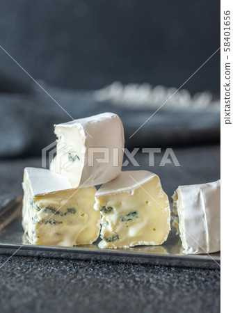 Soft cheese with white and blue mold Soft cheese with white and blue mold 58401656