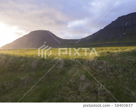 beautiful snow cliffs mountain and hills in Fljotavik cove, Hornstrandir, west fjords, Iceland, with beautiful snow cliffs mountain and hills in Fljotavik cove, Hornstrandir, west fjords, Iceland, with 58403637
