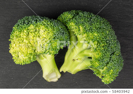 Fresh breen broccoli on grey stone 58403942