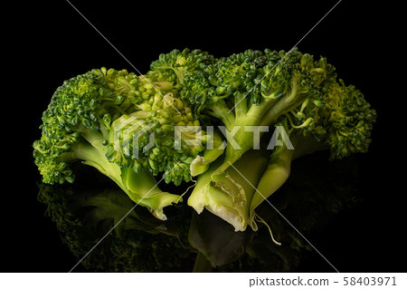 Fresh breen broccoli isolated on black glass 58403971