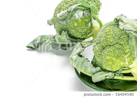 Fresh green broccoli isolated on white Fresh green broccoli isolated on white 58404590