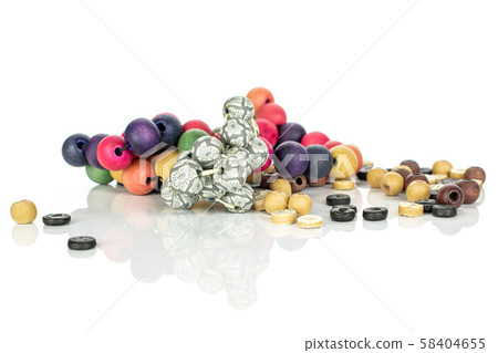 Colorful wooden bead isolated on grey wood 58404655