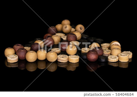 Colorful wooden bead isolated on black glass Colorful wooden bead isolated on black glass 58404684