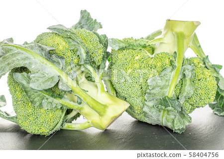 Fresh green broccoli isolated on white Fresh green broccoli isolated on white 58404756