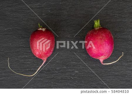 Fresh red radish on grey stone 58404810