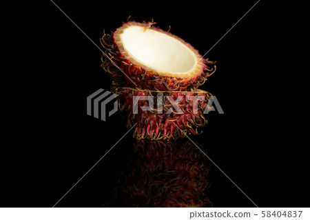 Fresh red rambutan isolated on black glass 58404837