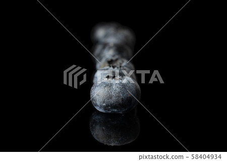 Fresh blueberry isolated on black glass 58404934