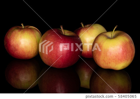 Red jonagold apple isolated on black glass 58405065