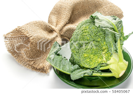 Fresh green broccoli isolated on white Fresh green broccoli isolated on white 58405067