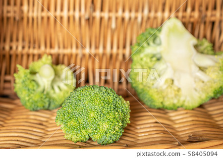 Fresh green broccoli with braided rattan 58405094