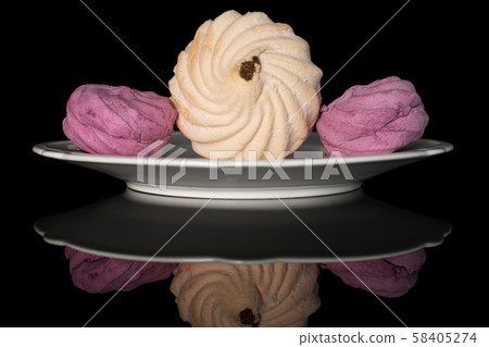 Fresh pastel sweet zefir isolated on black glass 58405274