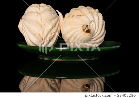 Fresh pastel sweet zefir isolated on black glass 58405280