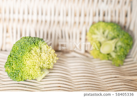 Fresh green broccoli with braided rattan 58405336