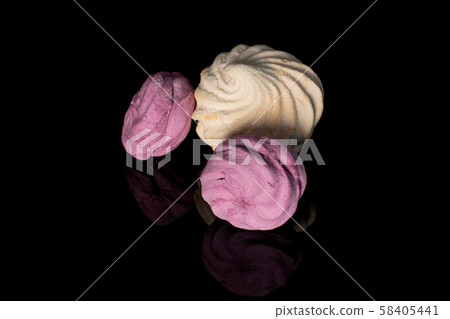 Fresh pastel sweet zefir isolated on black glass 58405441