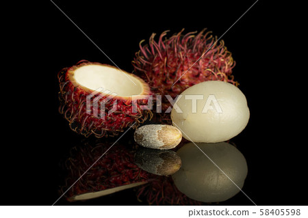 Fresh red rambutan isolated on black glass 58405598